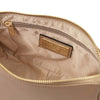 Interior view of Leather Clutch Bag showing zipper and lining details for elegance and organization.