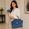 Woman Holding The Handbag and Wallet Of The Denim Leather Handbag And Wallet Set