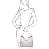 Woman Posing With The White Leather Handbag For Women