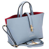 Angled And Shoulder Strap View Of The Light Blue Leather Handbag