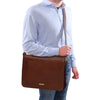 Man Posing With The Brown Leather Messenger Bag For Men