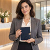 Business Woman Holding The Dark Blue Leather Planner - Weekly Diary In The Foyer Of A Corporate Office