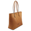 Angled View Of The Natural Leather Shopping Tote Bag