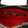 Interior view of Genuine Leather Shoulder Bag for Women featuring red lining and zippered pocket.