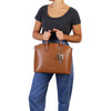 Woman Posing With The Cognac Leather Tote