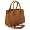 Angled And Shoulder Strap View Of The Natural Leather Tote Handbag