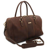 Angled And Shoulder Strap View Of The Dark Brown Leather Travel Duffle Bag Small