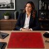 Leather Desk Pad displayed on a stylish office desk with a professional woman seated, showcasing its elegance and functionality.