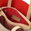 Opened Internal Zipped Compartment View Of The Caramel Leather Handbag