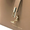 Leather Handbag close-up showcasing the craftsmanship and gold detailing.