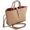 Angled And Shoulder Strap View Of The Caramel Leather Handbag