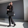 Woman Posing With The Black Leather Womens Handbag