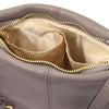 An internal compartment view with open pocket  of the grey Leather Ladies Handbag in pebbled leather