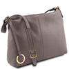 An angled and should strap view of the grey Leather Ladies Handbag in pebbled leather