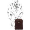 Man Holding The Dark Brown Leather Laptop Backpack