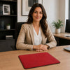 Leather Mouse Pad on an office desk with a professional woman smiling in a suit, enhancing workspace aesthetics.