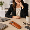 Leather Pen Pouch on a desk beside a laptop and coffee, showcasing stylish organization for pens.