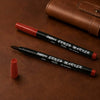 Leather Touch Up Pen and brush marker on brown leather surface.