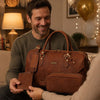 Leather Travel Gift Set showcased with a man smiling, holding a duffle bag, toiletry bag, and passport cover.