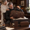 Leather Travel Gift Set featuring a stylish duffle bag, toiletry bag, and passport cover in an elegant setting.