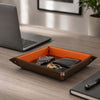 Leather Valet Tray holding keys, wallet, watch, and coins on a stylish desk with laptop.