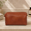 Leather Wash Bag made from premium Italian leather, featuring zip closure and practical design for modern travelers.