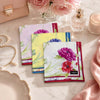 Ladies Floral Hankies 6 Pack Set featuring vibrant floral patterns on cotton handkerchiefs.