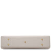 Luxury Leather Shoulder Bag in beige with gold accents and protective feet on the bottom.