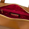 Interior view of Luxury Leather Shoulder Bag showing rich red lining and brand label.
