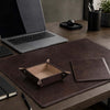 Luxury Leather Desk Set featuring a dark brown leather desk pad, valet tray, and mouse pad on a stylish office desk.