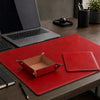 Luxury Leather Desk Set featuring a red leather desk pad, valet tray, and a modern laptop.