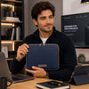 Luxury Soft Leather Tablet Case held by a man in a stylish office setting, showcasing premium design.