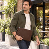 Man In The Street Holding The Dark Brown Mens Italian Leather Clutch Bag