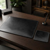 Elegant Leather Desk Set featuring matching desk pad and mouse pad on a wooden desk in a stylish office setting.