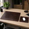Elegant Leather Desk Set featuring a matching desk pad and mouse pad on a modern workspace.