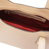 Internal Zip Pocket View Of The Champagne Genuine Leather Tote Handbag