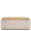 Raffia Shoulder Bag with a woven raffia body and pebbled leather base featuring gold hardware details.