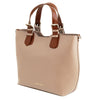 Angled View Of The Nude Two Tone Leather Handbag