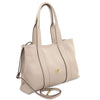 Leather Shoulder Bag and Zip Around Wallet Set in elegant beige with stylish handles and gold logo.