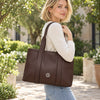 Woman In The Street With The Chocolate Shoulder Bags For Women Over Her Shoulder