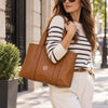 Beautiful woman in the street carrying the Cognac Shoulder Bags For Women