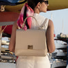 Woman Posing With The Light Taupe Leather Handbag Backpack Convertible