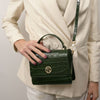 Woman Posing With The Forest Green Small Croc Print Handbag