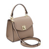 Angled And Shoulder Strap View Of The Light Taupe Small Leather Shoulder Bag