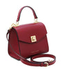Angled And Shoulder Strap View Of The Red Small Leather Shoulder Bag