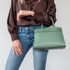 Woman Holding The Mint Green Small Tote Bag
