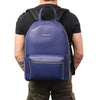 Man Posing With The Dark Blue Soft Leather Backpack