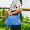 Woman Posing With The Blue Soft Leather Handbag