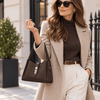 Woman In The Street Holding The Chocolate Soft Leather Handbag 