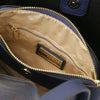 The Dark Blue Soave Soft Leather Handbag interior view showcasing the Beige lining and organized compartments.